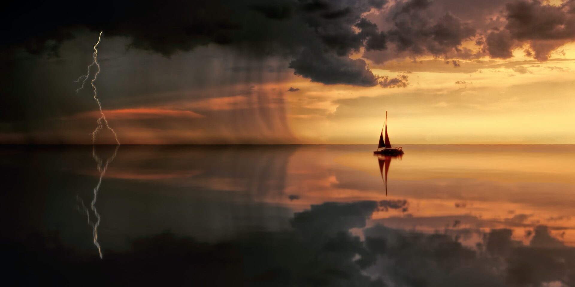 A boat is sailing on the water under a cloudy sky.